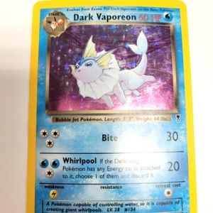 RARE 2002 Dark Vaporeon 9/110